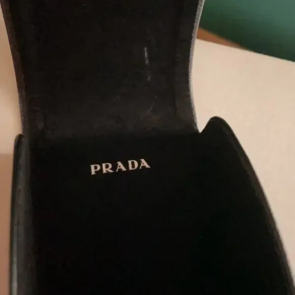 Prada 61mm Oval Sunglasses silver